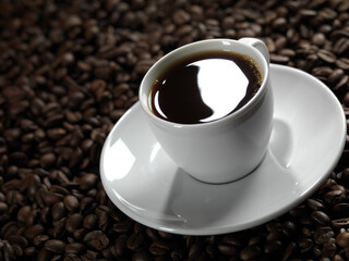 Cup of Coffe on Coffee Beans