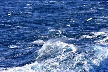 Big waves at open sea. Summer monsoon in Indian Ocean