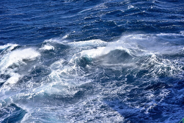 Big waves at open sea. Summer monsoon in Indian Ocean