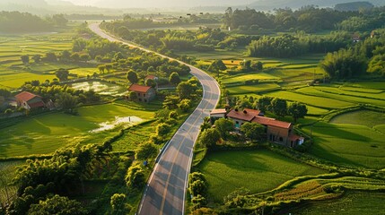 Highway and rural village, small houses, fields, tranquil scenery