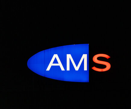 Vienna, Austria: AMS Austrian Public Employment Service sign in the night