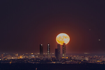 moon over the city Madrid 