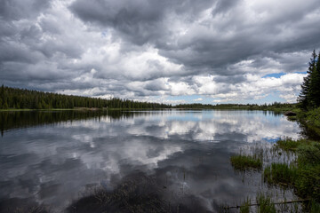 Summer storm clouds gathering over Brainard Lake in Brainard Lake Recreation Area, Colorado.