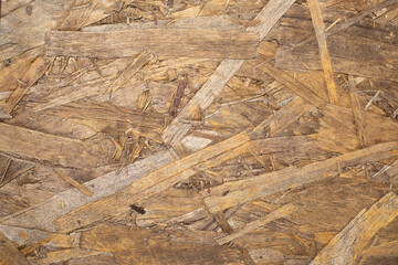 Pressed sawdust texture. Background made of building material. Pressed material.