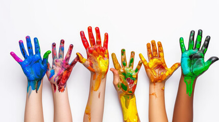 Children showing painted hands on white background