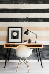 A computer desk with a monitor, keyboard, and mouse. A vase with flowers sits on the desk