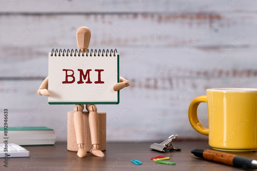 Poster there is notebook with the word bmi. it is an abbreviation for brain machine interface as eye-catchi
