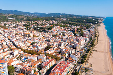 Obraz premium Townscape of Canet de Mar, Maresme region, Catalonia, Spain. View of sea coast and beach.