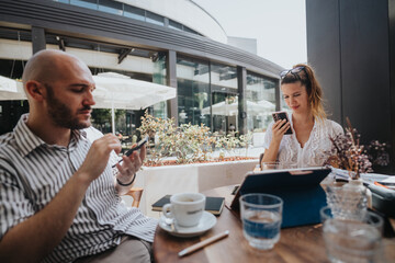 Startup team in a business meeting discussing, brainstorming, analyzing and strategizing at an outdoor cafe with coffee and digital devices.
