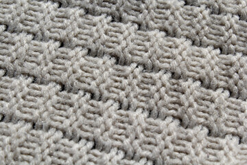 Close-up of textured knitted fabric abstract background