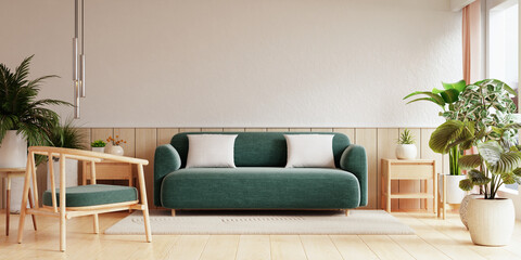 Living room features a modern design with a green sofa and matching armchair, complemented by white cushions and surrounded by lush indoor plants for a refreshing atmosphere- 3D rendering