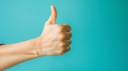 Positive online review concept image with a hand doing a thumbs-up
