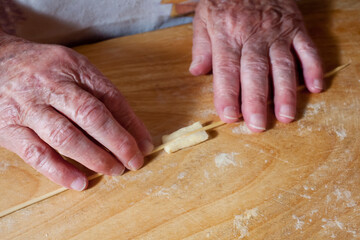 Traditional Pasta-Making with Elderly Hands