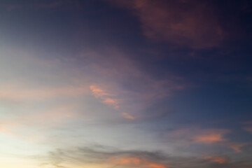 Clouds with warm light and blue sky in the afternoon