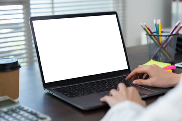 Woman hand using laptop and type on the keyboard, Mockup screen of advertisement.