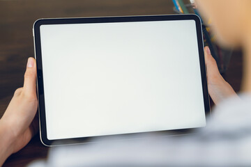 Woman hand using laptop and type on the keyboard, Mockup screen of advertisement.