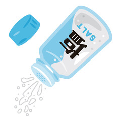 振りかけられる瓶に入った塩