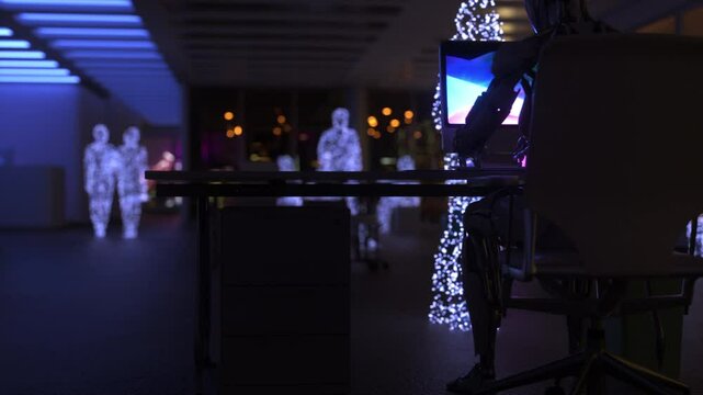 Collaborative Synergy: Robots and Digital Humans Working Together in the Office.3D rendering.