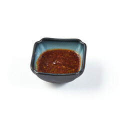 Thai Spicy Dipping Sauce with tamarind Puree in bowl isolated on white background. sour, sweet and spicy taste.