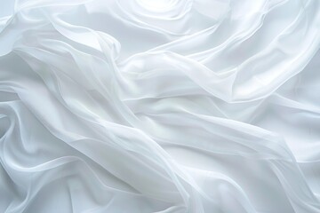 Obraz premium Soft white fabric drapes and flows in gentle folds, creating an ethereal and delicate texture