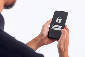 Man holding a smartphone to login username and password on screen. Data privacy online protection on mobile phone application.