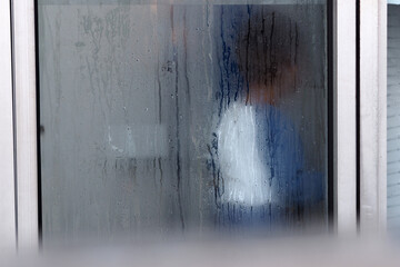 the young girl behind the foggy glass, good for article