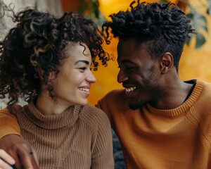 Smiling man and woman sharing affectionate glances in a heartwarming and joyful moment