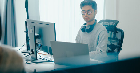 Group Adult Asia male, female freelance typing write prompt AI bot IT app smart program nomad, video game, terminal with coding language, user interface, designer, big data center on desktop computer.