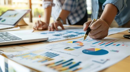 Business consulting meeting is discussing business plan analysis with financial data and business growth charts to plan strategies for generating company profits. copy space.