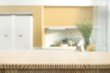 Selective focus.End grain wood counter top with  blur kitchen in morning light window background.