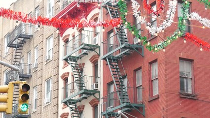 New York City Little Italy ethnical district decoration. Manhattan classic red brick building architecture. Italian decor and residential houses near Grand and Mulberry street. American immigration.