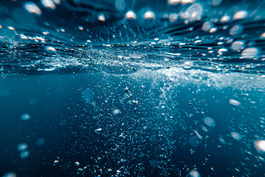 Underwater view with bubbles rising to the surface in a deep blue ocean. The image captures the serenity and mystery of the underwater world.