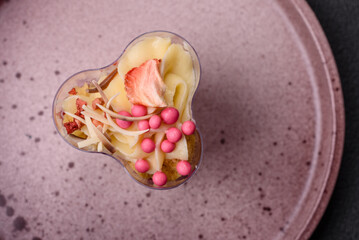 Delicious nutritious vegan dessert trifle with berries, cheese cream