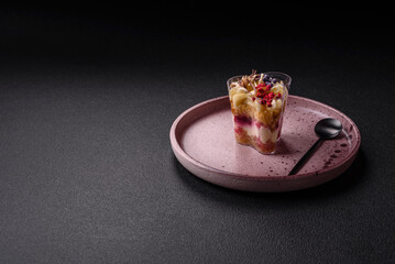 Delicious nutritious vegan dessert trifle with berries, cheese cream