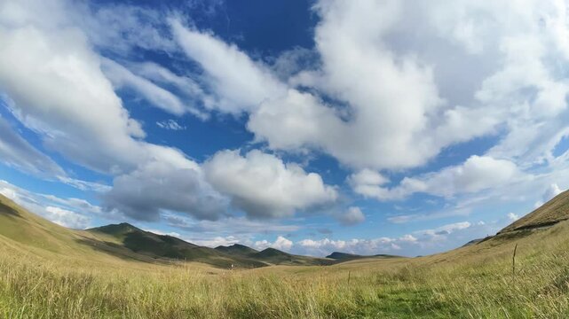 Low ground angle time lapse landscape summer in the Carpathian Mountains. Wide angle time-lapse in alpine environment with fast moving clouds