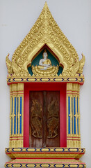 Closeup of Thai style buddhism temple doors and windows of Thai Buddhist Temple in Bangkok, Thailand