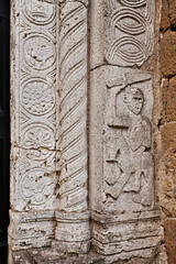 Sovana, Grosseto, Tuscany, Italy: detail of the cathedral portal in carved travertine