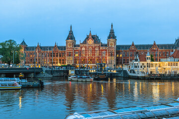 Obraz premium Amsterdam Centraal station, the largest railway station in Amsterdam, North Holland, the Netherlands