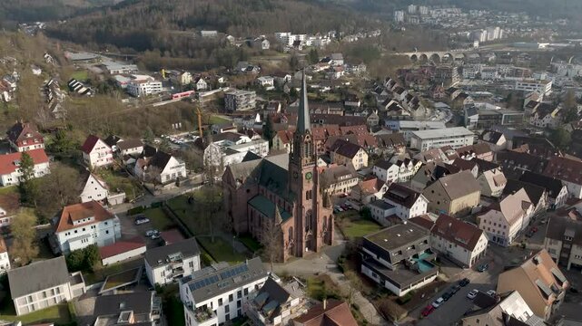 Drone footage of Swabian church in Nagold, Baden-W&uuml;rttemberg. Southern German town with traditional religious landmark.