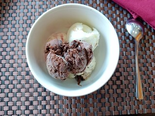 a bowl of chocolate and vanilla flavored gelato ice cream