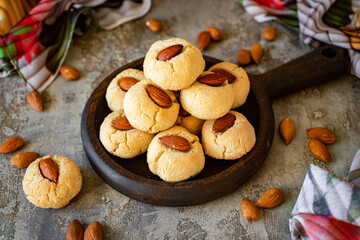 Sweet nut cookies for dessert on a gray background. Homemade cookies with nuts for breakfast. Close-up