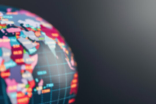 Blurred world map showing colorful continents on a dark background, representing global diversity and international connections.