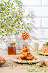 mini waffles with honey and berries