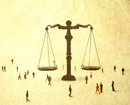 Illustration of oversized scales of justice surrounded by people