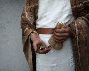 Ancient man with silver coins