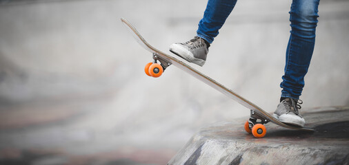 Skateboarder skateboarding at skatepark in city © lzf