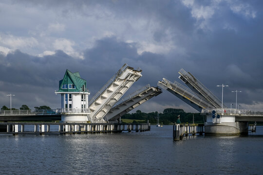 Germany, Schleswig-Holstein, Kappeln, Storm clouds over Schleibrucke
