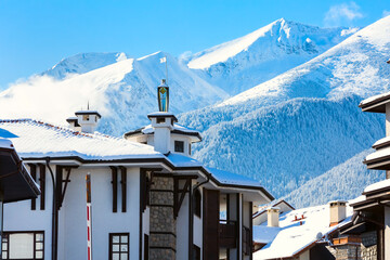 Houses and snow mountains in ski resort Bansko