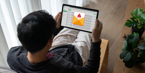 Cyber attacking concept. Malware alert showing on computer screen display scam and threat detection on computer system or online server to be removed snugly.