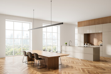 Elegant home kitchen interior with dining table and chairs, cabinet and window